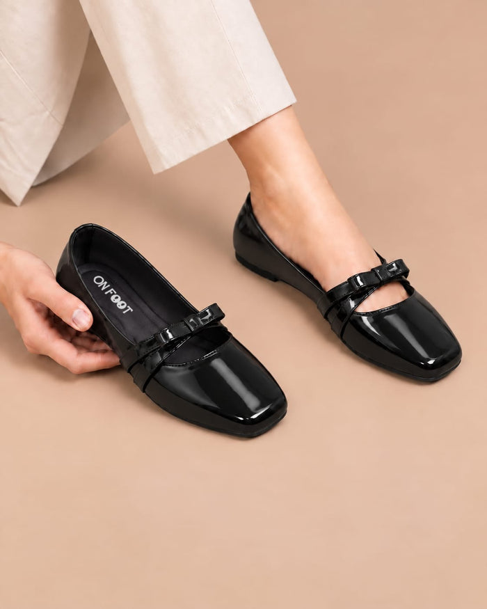 Black Luxe Bow Pumps by ON FOOT - glossy patent bow pumps, front view