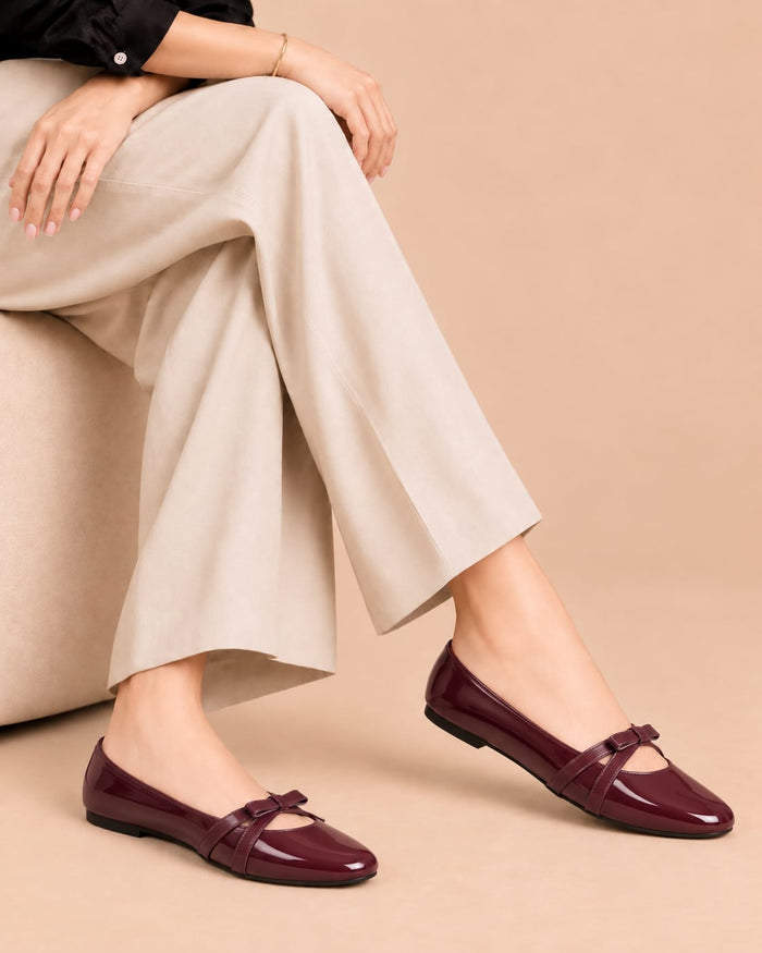 Maroon Luxe Bow Pumps by ON FOOT - glossy patent bow pumps, side view